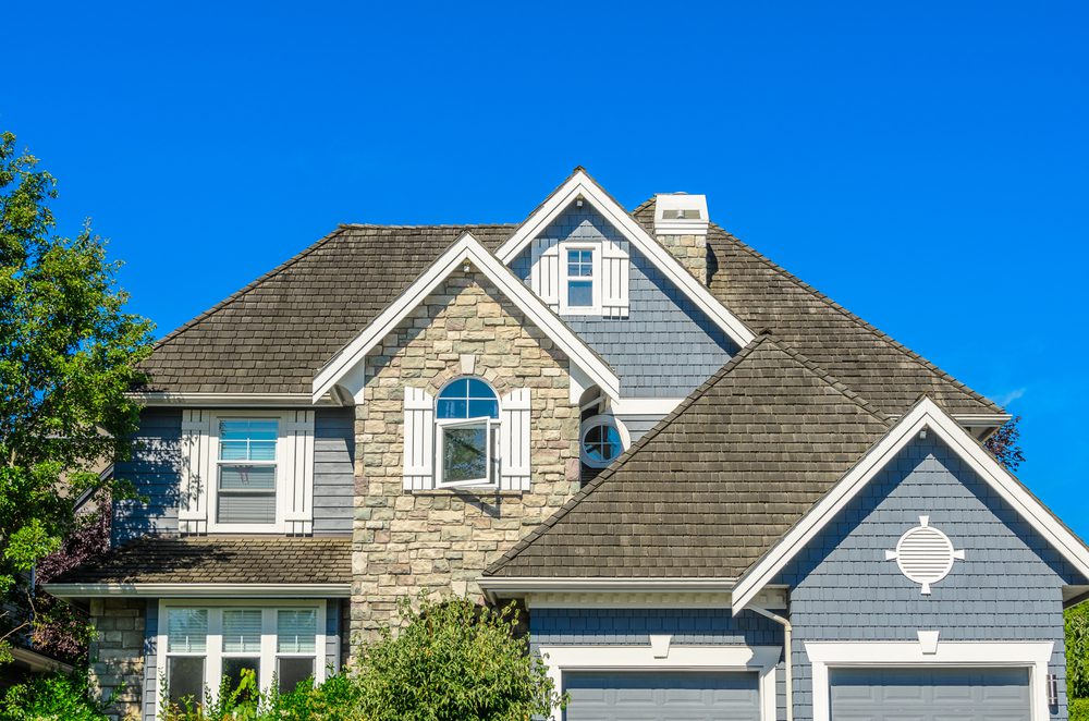 Newly completed Class 4 impact-resistant shingle roof replacement on a Fort Worth home